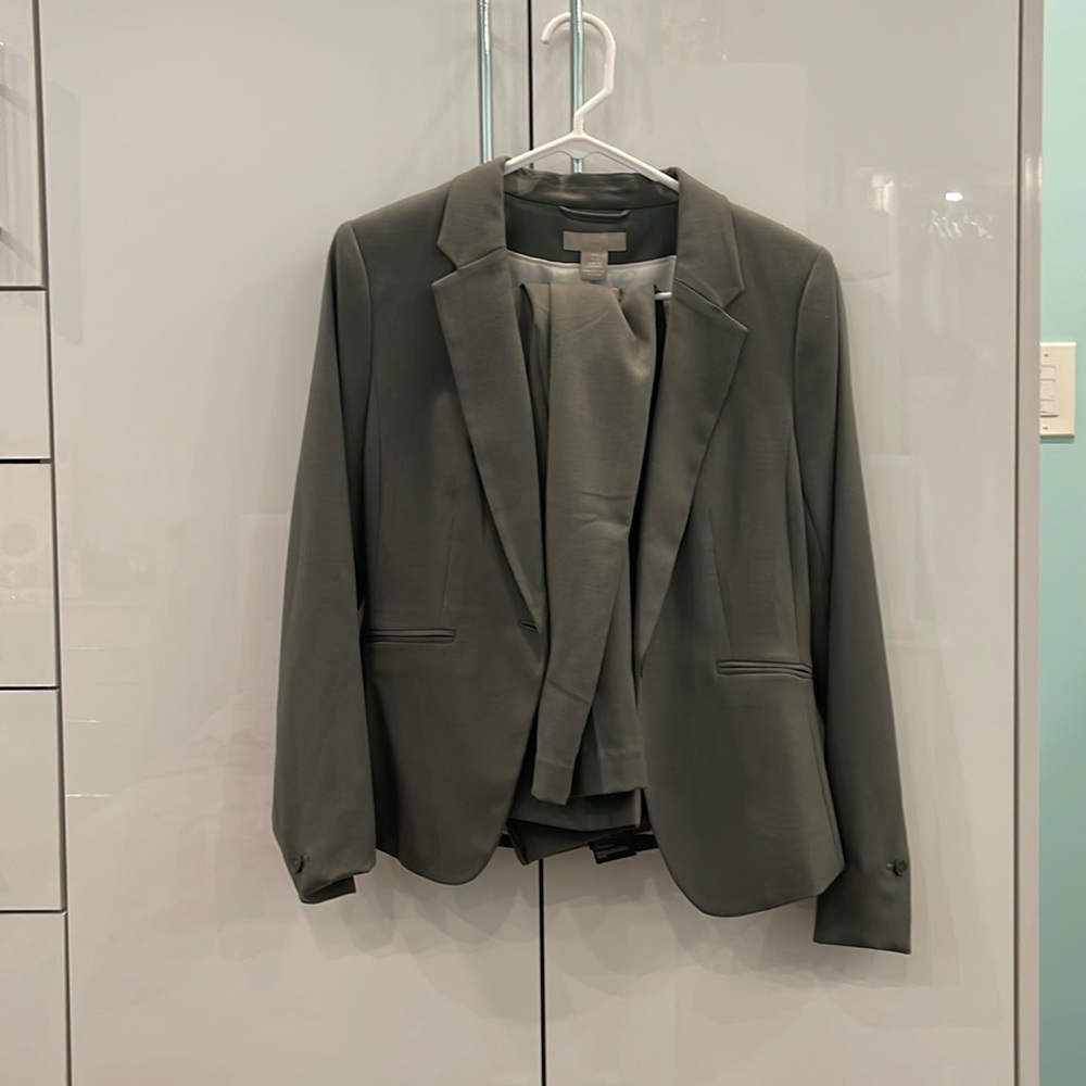 Olive green suit from h&m. Blazer is size small. Pants are size 2. Never worn.